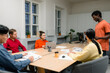 © DZ FILM/Stocksy - Meeting in the office