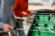 © DZ FILM/Stocksy - A man and a woman are playing table football