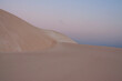 calm desert landscape. dunes in the gentle evening light. sand texture