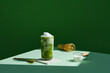 © Marc Tran/Stocksy - Organic green matcha tea with milk and accessories for making
