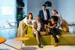 © BONNINSTUDIO/Stocksy - Group of diverse financial businesspeople having fun at workspace