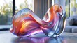 A colorful glass sculpture with fluid shapes sits elegantly on a table in a sunlit room exhibiting a blend of art and design. 