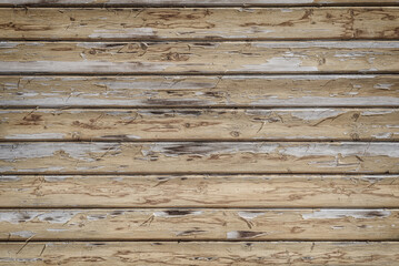 Wall Mural - Old wooden wall of peeling boards, background.