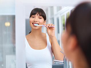 Poster - Woman, brush and teeth in bathroom with mirror for dental in portrait with confidence for health. House, smile and self care with pride for clean mouth in morning with hygiene for routine with fresh