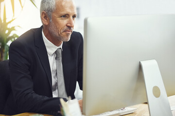 Aufkleber - Computer, management and experienced business man at desk in office as CEO of corporate company. Desktop, job and work with mature boss or manager at table in professional workplace for online report
