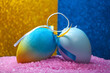 Colorful Easter Eggs on Pink Textured Background