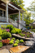 © Raymond Forbes LLC/Stocksy - Stairway of porch and garden