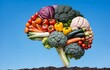 Variety of vegetables are arranged to form human brain.