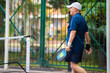 © A2 Images/Stocksy - Man playing pickleball