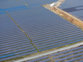 Solar farm drone shot - telephoto images of solar panels