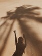 © Asya Molochkova/Stocksy - Shadow on the beach in sunny day