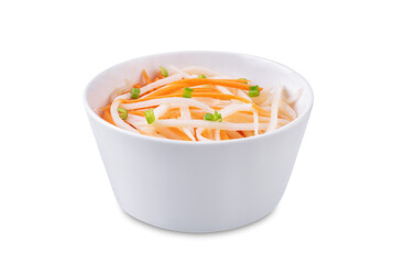 Wall Mural - Daikon radish carrot noodles salad on a white isolated background