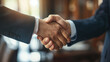 © TAMEEM - handshake between two professionals