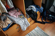 © Lupe Rodríguez/Stocksy - ugc of messy closet in a bedroom