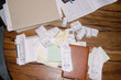 © Oleksii Syrotkin/Stocksy - Assorted Paperwork and Receipts on Table