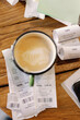© Oleksii Syrotkin/Stocksy - Coffee on cafe receipts