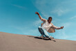 © Lucas Ottone/Stocksy - Active black man skateboarding on a ramp
