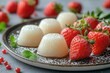 Mochi dessert. Plate with delicious mochi and strawberry on white background