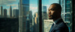 © necropos12 - A confident businessman gazes intently through the window. The background consists of a blurred cityscape with multiple skyscrapers.Copy space