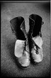 © Jan Michalko/Stocksy - A pair of worn boots