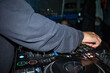 © Synchro Shoot/Stocksy - DJ at a party