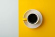 yellow and white coffee cup on bright background top view composition