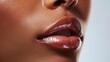 © Justlight - The faint outline of lip gloss adding a touch of ity to the lips. .