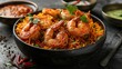 Delicious Indian Spicy Rice Dish Garnished With Tasty Shrimp Served on Elegant Black Table