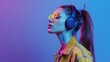 Portrait of a young woman with closed eyes listening to music with headphones.