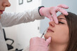 Beautician injecting Botox for nose beauty treatment: cosmetic procedure for skin rejuvenation and nasal enhancement