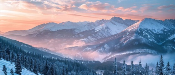 Wall Mural - The mountains are covered in snow and the sky is a beautiful mix of pink