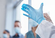 Doctor, hands and gloves for ppe protection or medical surgery for hygiene, compliance or pandemic. Person, fingers and hospital or virus outbreak with safety immunity or operation, latex or clean