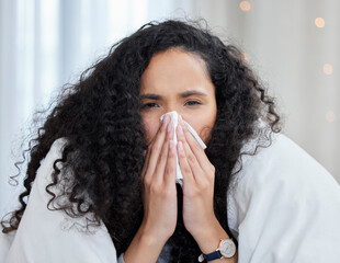 Canvas Print - Woman, sick and home with tissue in portrait with blowing nose under blanket for cold, fever and fatigue. Flu, health and allergy with unwell for medical with healthcare for influenza with illness