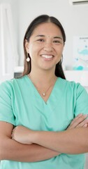 Poster - Healthcare, dentist and portrait of Asian woman with arms crossed for dental care, service and pride. Happy, clinic and face of person with smile for oral hygiene, healthy teeth and confidence in job