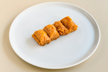 Turkish Dessert Sobiyet  Baklava, mussels baklava and classic baklava with Pistachio . Cevizli, Fistikli Baklava, top view.