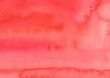 にじみのある赤色の水彩背景素材