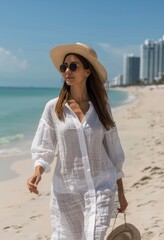 Wall Mural - Woman in White Dress Walking on Beach