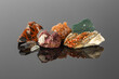 Group of Stones and Minerals on Reflective Surface