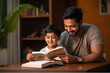 © Niks Ads - indian father teaching or helping the son for reading a book