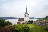 Fototapeta  - Church Neuenburg Biel Ligerz Switzerland water wineyard mountains