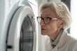 Scientist, worker, or lab autoclave for medical research, vaccination temperature control, or DNA engineering. Zoom, pondering face, older woman, medical science centrifuge