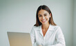 © my life style - portrait of a smiling businesswoman working on her laptop
