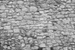 Stone wall background, close-up. Large stones surface texture for publication, poster, calendar, post, screensaver, wallpaper, cover, website. Toned high quality photo