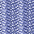 Modern stripe spliced effect in masculine indigo blue seamless pattern. Irregular chambray style brushed striped line design. 