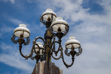 Lamps on the street during the day against the sky. isolated sky background