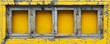 Saturated yellow colored low contrast Concrete textured background 
