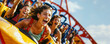 © Sunshower Shots - People on a roller coaster thrill ride, theme park, amusement, wide, summer fun, vacation, copyspace