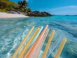 A bunch of straws are floating in the ocean. The straws are of different colors and sizes. The scene is peaceful and serene, with the ocean and the straws creating a sense of calmness