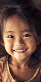 Fototapeta Do akwarium - Close-up of a happy little asian girl smiling