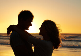 Poster - Couple, love and smile at beach with sunset for date or summer holiday and bonding in Florida. Relationship, silhouette and romance together as soulmate with travel, hug and vacation for honeymoon